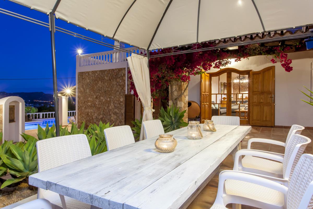 Outside dining room illuminated at night
